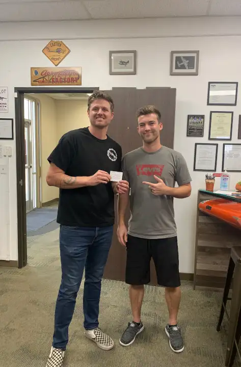 src/assets/student-and-cfi-at-nextgen-head-office-in-riverside-ca