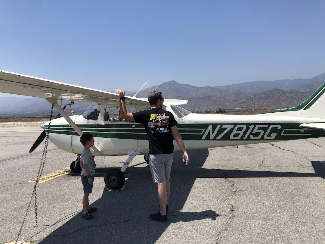 Pilot and child at Redlands Airport with Cessna 172